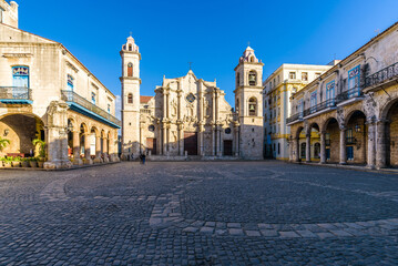 Fototapeta na wymiar View of the Square of the Cathedral of the Virgin Mary in Havana, Cuba (Plaza de La Catedral de la Virgen María de la Concepción Inmaculada de La Habana in Spanish), on a sunny morning.