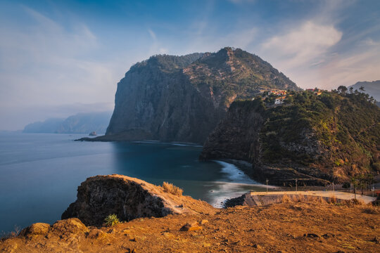 Porto da Cruz village with Eagle Mountain and coast, Madeira, Portugal. October 2021. Long exposure picture