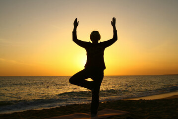 A yoga posture on the beach