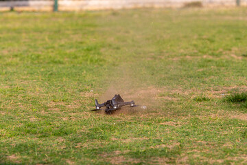 Fototapeta premium Drone crashing into the ground during flight. BLURRY