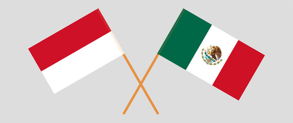 Crossed flags of Indonesia and Mexico. Official colors. Correct proportion