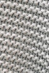 A fragment of a soft woolen product. DIY. Background image