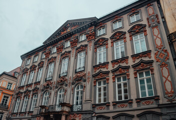 Old building with windows. Beautiful landmark in the city of Munich, in Germany. Tourist attraction.