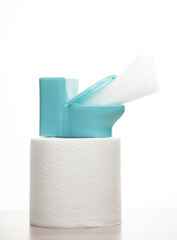 image of miniature toilet paper roll white background