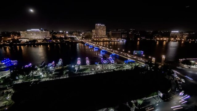 Timelapse video from Cairo,Egypt shows Nile river , Qasr elnile bridge and the traffic of cars and boats  