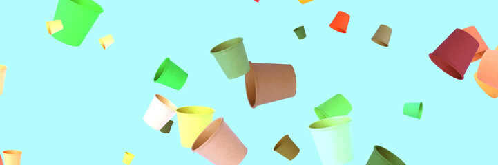 falling paper disposable colored cups. glasses of different sizes and colors