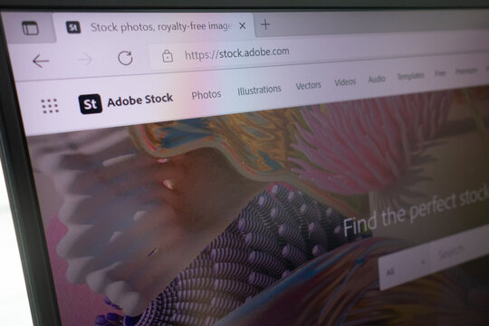 KONSKIE, POLAND - April 27, 2022: stock.adobe.com Adobe Stock website displayed on laptop