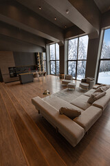 chic modern design of a dark expensive interior of a luxurious country house with huge panoramic windows and a magnificent view of the divine forest