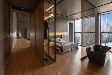 chic modern design of a dark expensive interior of a luxurious country house with huge panoramic windows and a magnificent view of the divine forest