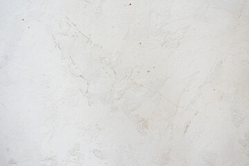 artistic plaster on a gray and white wall. Repairs. elements of wall decor. copy space. texture. background.