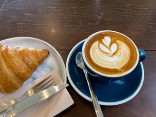 croissant and cup of coffee