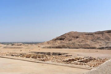 View of Deir el-Bahari from the Temple of Hatshepsut, towards the Nile valley. Archaeological site near the temple of Queen Hatshepsut.