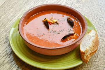 Tomato soup with seafood. Seafood Chowder. Shallow depth of field