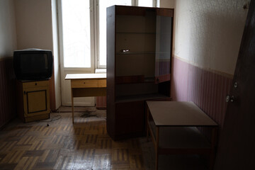 old abandoned room with dirty broken furniture