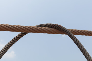 Iron metal cable uses for support suspension bridge the industrial construction.