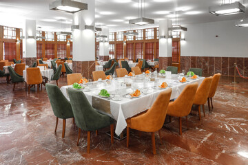 Restaurant in modern interior and round tables and brown wooden walls