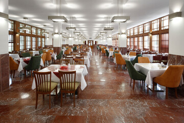 Restaurant in modern interior and round tables and brown wooden walls