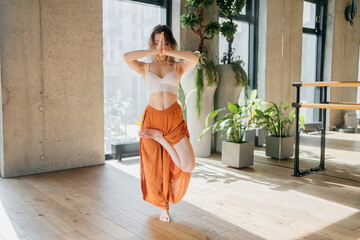 Woman training yoga pose asana, flexible body and healthy lifestyle. The concept of health