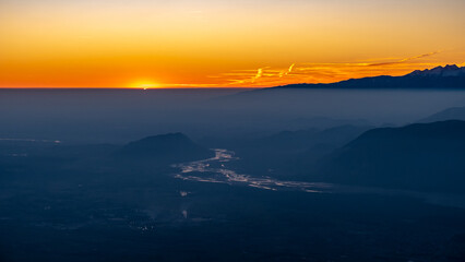 Winter sunset from an alpine peak of Friuli-Venezia Giulia