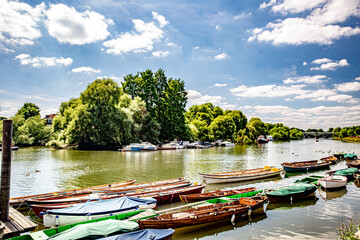 Inside out view of Rowing boats for rent under Richmond bridge at the river Thames, London, United...
