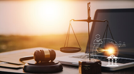 Judge gavel and legal book on wooden table, justice and law concept