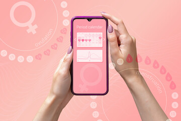 Menstrual cycle tracker mobile app on the smartphone screen in the hands of a woman. Modern...