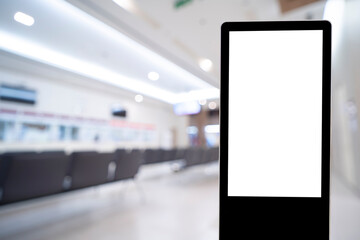 Billboard mock up inside the hotel building near reception area. Template of an interior empty information billboard