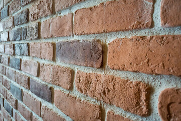 Perspective of brick wall with blurred texture Background.
