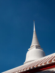 White Pagoda,Tops Buddhist pagodas isolate blue