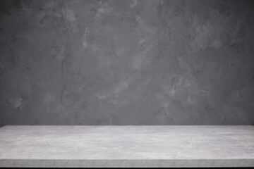 Front view of tabletop near grey wall. Top table