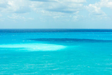 Fototapeta na wymiar Turquoise water background. Ionic blue sea.