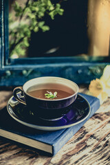 Tea. Retro composition. Focus on tea liquid.