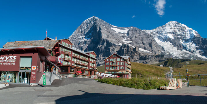 Kleine Scheidegg, Lauterbrunnen, Switzerland - 04 September: Hotels on the train and snowy rocks on the train station