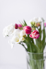 Pink Tulips Flowers Bouquet on a Light Background