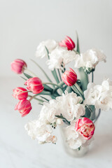 Pink Tulips Flowers Bouquet on a Light Background