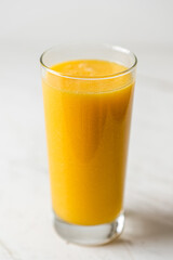 Healthy Detox Orange and Yellow Citrus Smoothie Glass