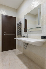 bathroom with mosaic beige tiles, modern bathroom