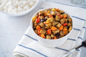 Roasted eggplants with vegetables and rice