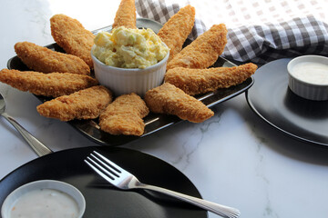 Chicken Strips and Potato Salad, ready to serve.