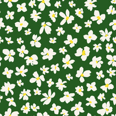 Flower heads seamless repeat pattern. Random placed, vector ditsy daisy floral all over surface print on green background.