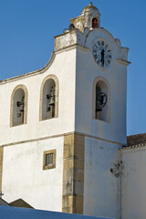 Fototapeta premium bell tower of the church of Fuseta, Portugal
