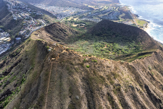Aerial drone view of Koko Head Crater, it's railroad trail directly to the peak, and the botanical gardens within the crater