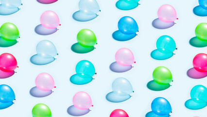 Multicolored balloons pattern on blue