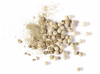 Grain, crushed and milled white pepper powder pile, peppercorn isolated on white, top view  