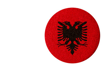 flag of Albania,round cork coaster isolated on white background copy space