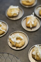 Preparing dinner. Boar, sea buckthorn, sauerkraut, crawfish, plate. Table, close-up, dining, background, lighting, people. Beautiful surroundings, adventure restaurant.