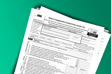 Form 990 documentation published IRS USA 12.22.2020. American tax document on colored