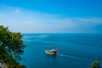 Naklejka na ściany i meble Antalya, Turkey. Sailing Ship For Sea Tours. Mediterranean landscape