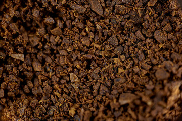 ground coffee macro microscope close-up strong grinding roasting placer soft focus