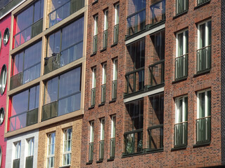 Close up of new modern building brick facade with red, brown blocks in Noblessner district. Tallinn, Estonia, Europe. April 2022